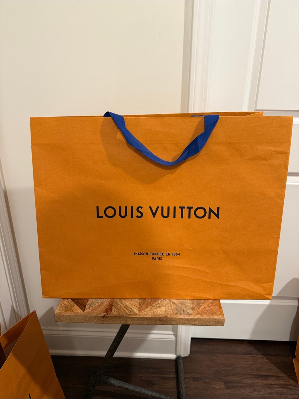 Louis Vuitton Orange Bag with Blue Ribbon Handles